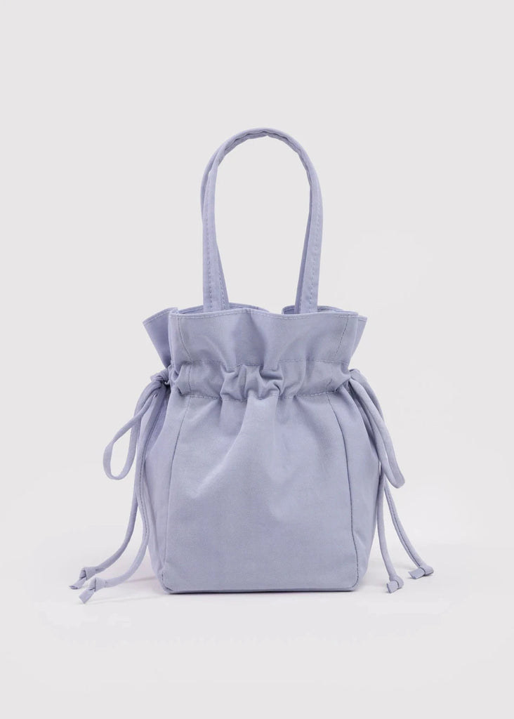 Light blue drawstring bag on a light gray background