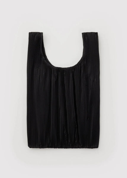 Black pleated bag on a light gray background