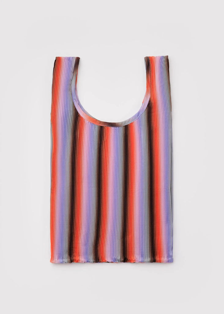 Multicolored striped tank top on a light gray background