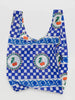 a blue checkerboard flower and cherry patterned reusable baggu bag on a white background