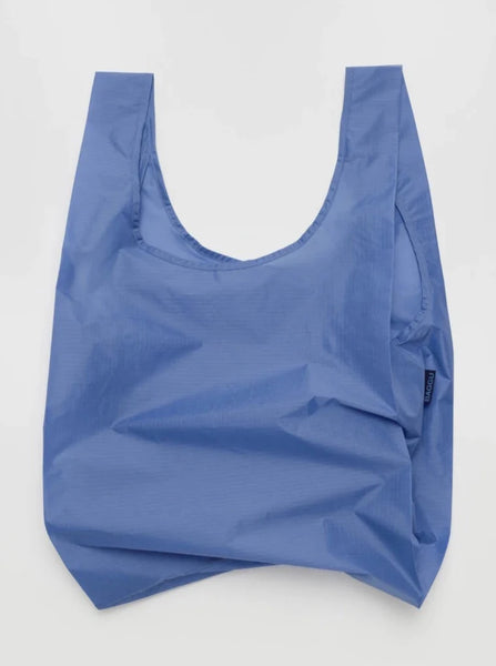 a cornflower blue reusable baggu bag on a white background
