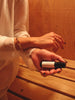 a black perfume oil roller scented with cedar and Santal 