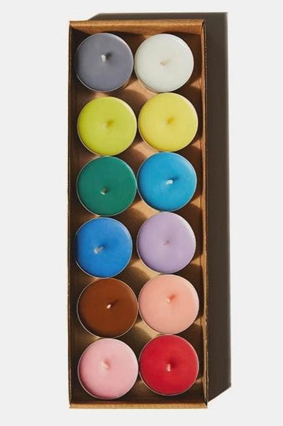 A box set of Rainbow Tea Light Candles sit inside a brown box in neat rows.