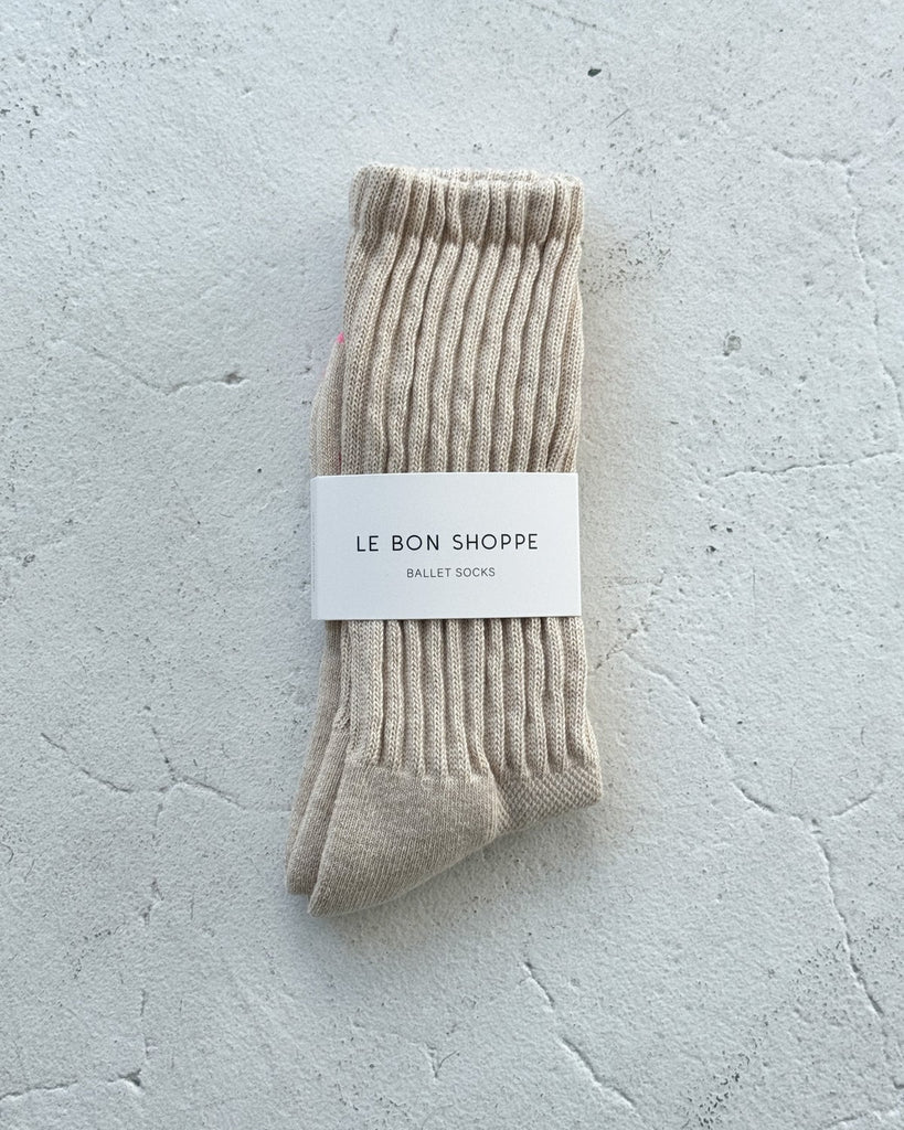 Pair of Oatmeal Ballet Socks with 'Le Bon Shoppe' label on a light gray textured background