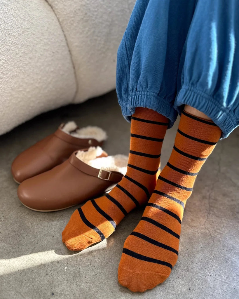 A person's legs wearing a pair of Wally Socks from Le Bon Shoppe in the color Camel