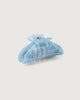 a light blue shell midi heirloom claw hair clip by machete sits on a white background.