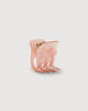 an apricot shell mini claw hair clip by machete sits on a white background.