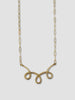 a small looped brass necklace on a white background - made by Natalie joy jewelry