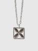 a necklace made by Natalie joy jewelry in sterling silver that looks like a flower inside a square