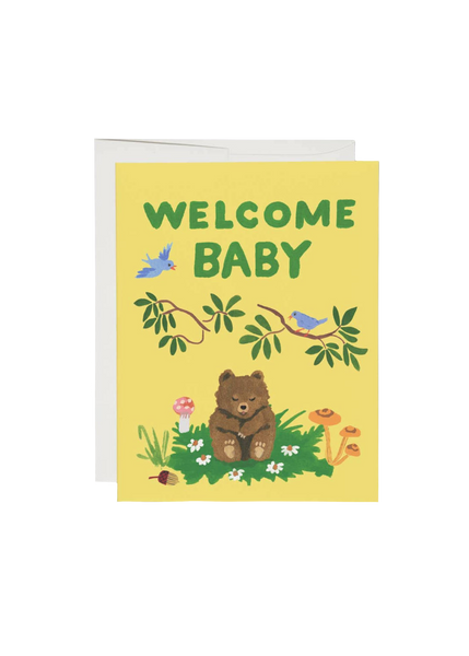 Greeting card with a bear illustration and 'Welcome Baby' text on a yellow background