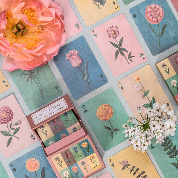 set of flower illustrated playing cards.