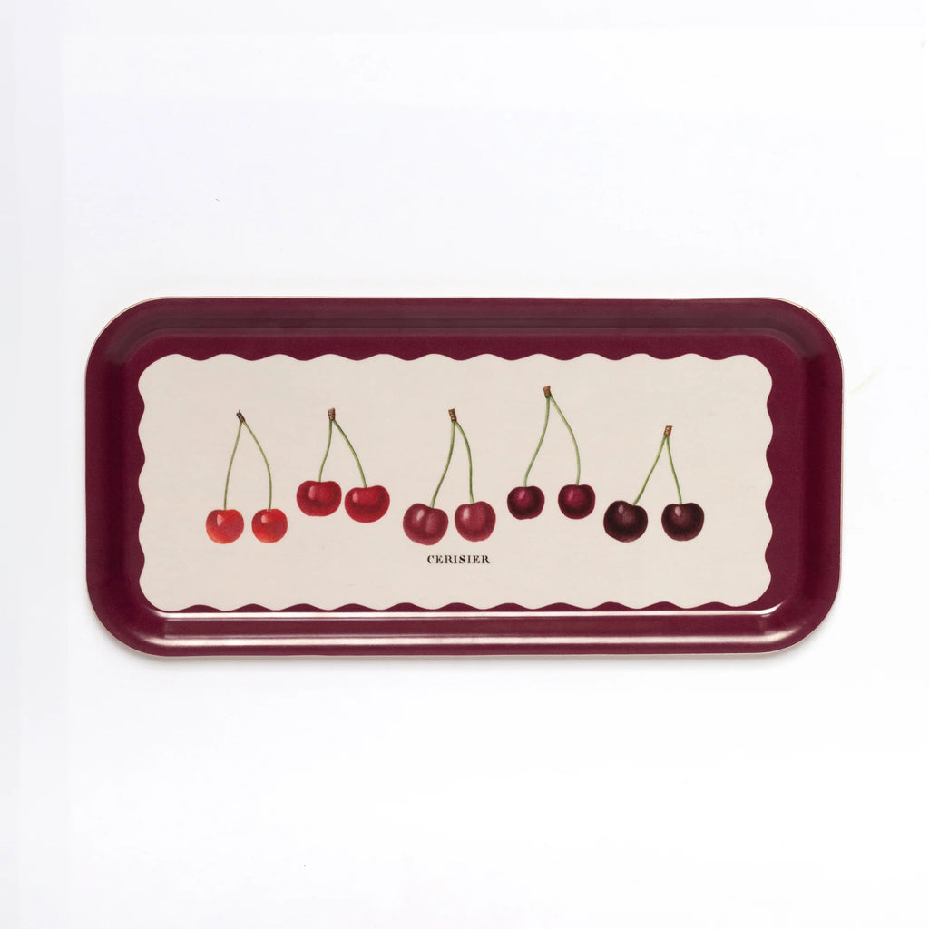 a birchwood tray with illustrated cherries on a white background.