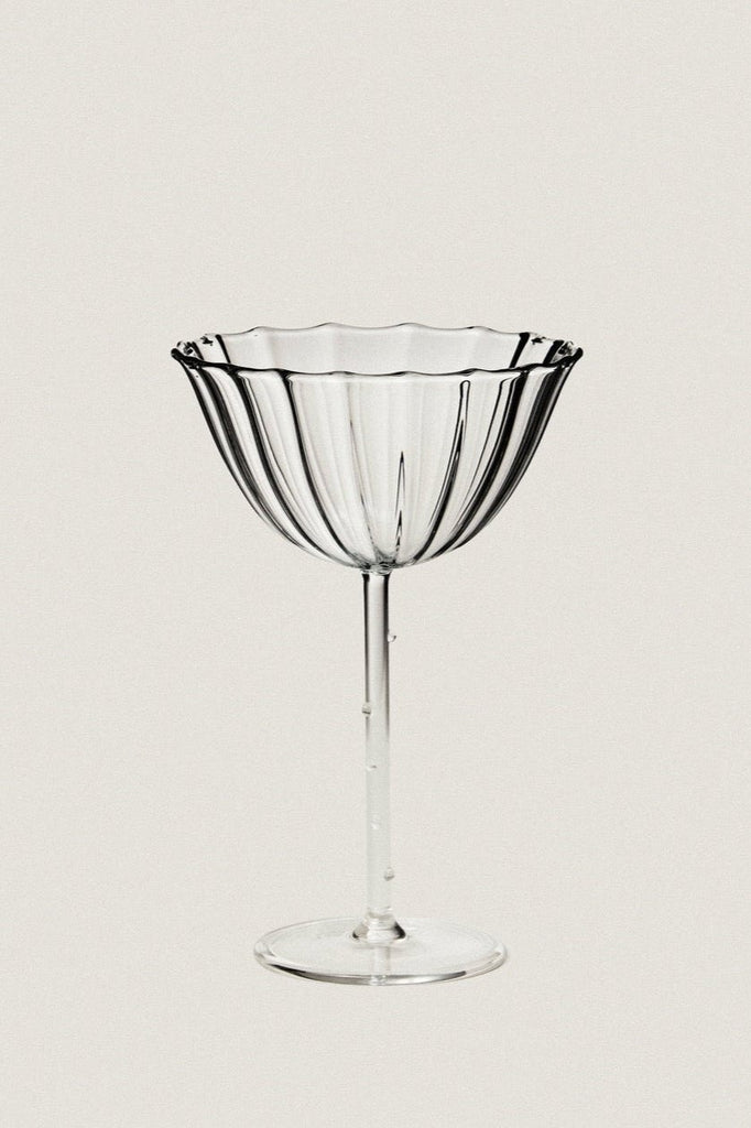 clear ribbed coupe glass by Sophie Lou Jacobsen