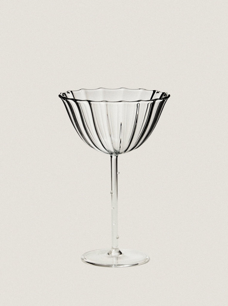 clear ribbed coupe glass by Sophie Lou Jacobsen