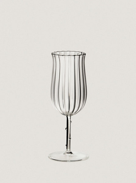 clear rippled wine glass by Sophie Lou Jacobsen 