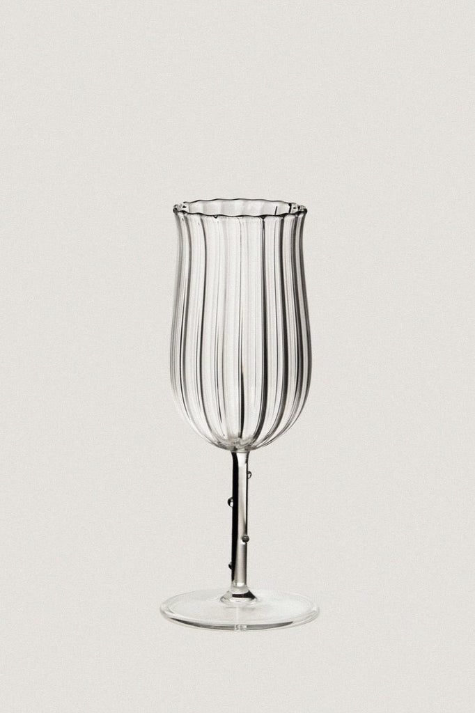 clear rippled wine glass by Sophie Lou Jacobsen 