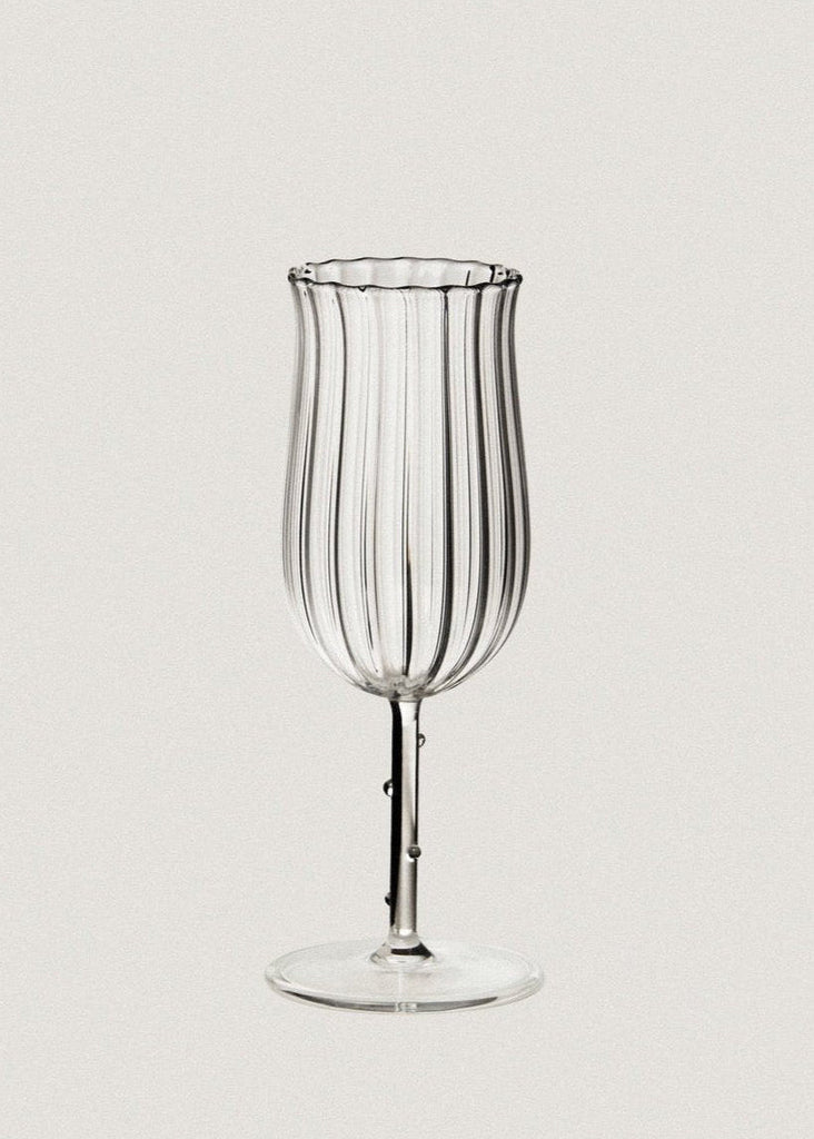 clear rippled wine glass by Sophie Lou Jacobsen 