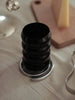 onyx black rippled drinking glass on spiral coaster