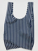 Navy and white striped reuseable baggu bag against a white background