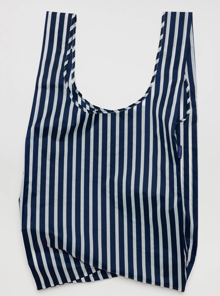 Navy and white striped reuseable baggu bag against a white background