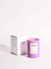 a white gift box and a frosted purple glass candle in the scent desert stargaze by Brooklyn candle company sits on a white background