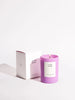 a white gift box and a frosted purple glass candle in the scent lilac haze by Brooklyn candle company sits on a white background